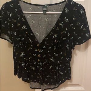 Low cut floral peplum top